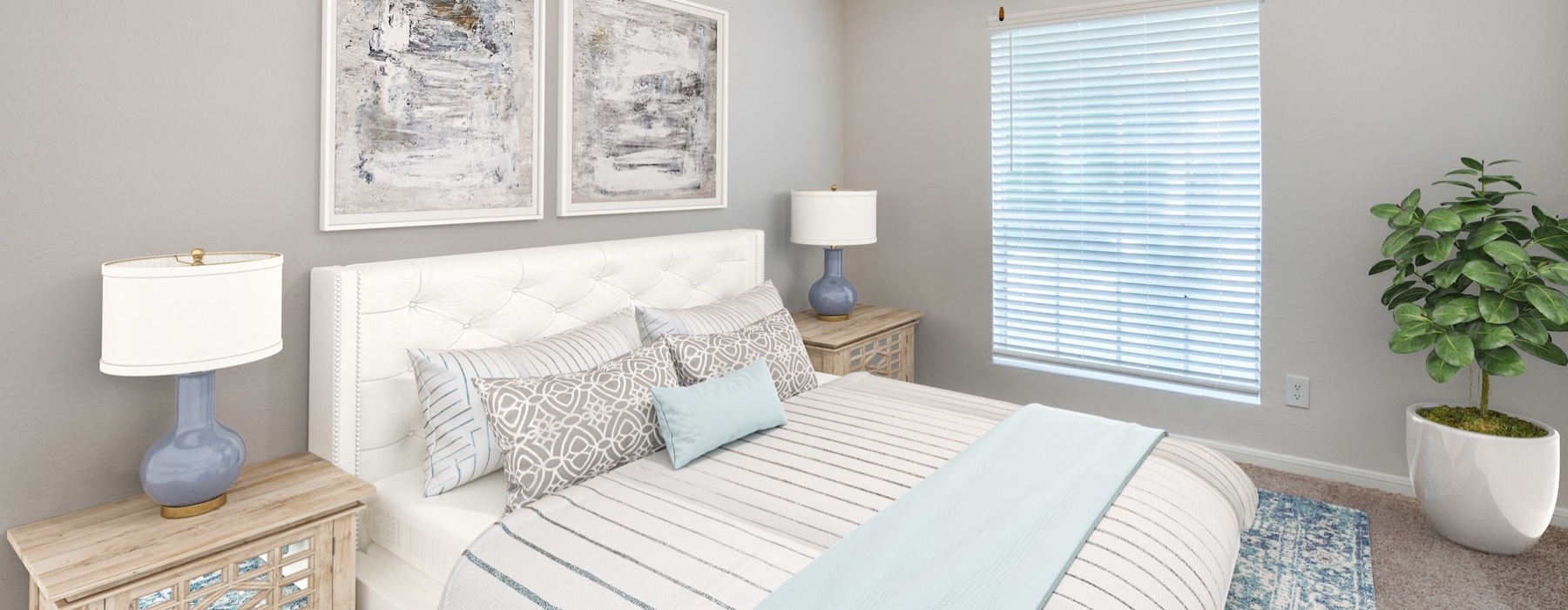a bedroom with a fan and a bed