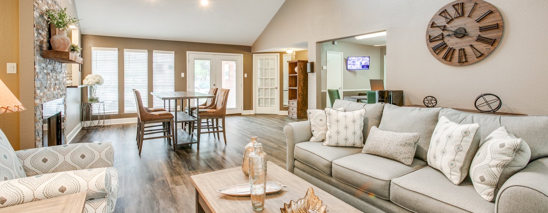 a living room with a couch and a table
