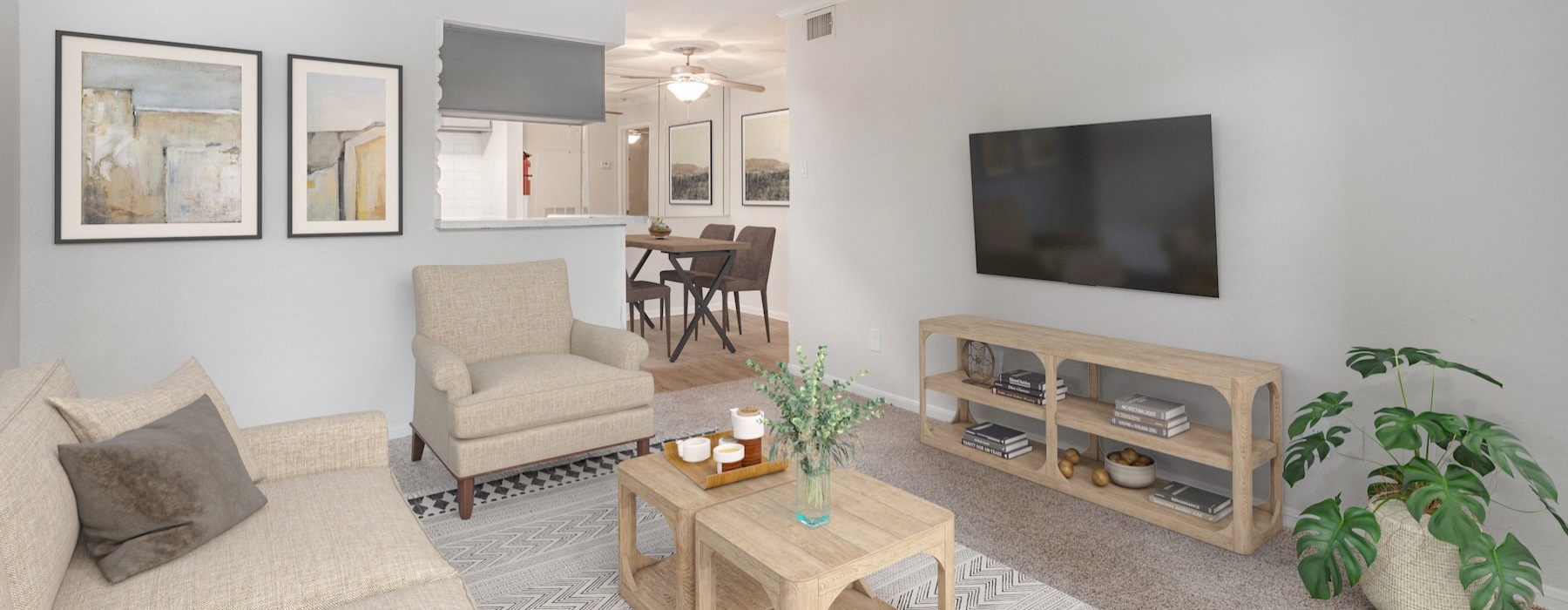a living room with a tv and couches