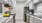 a kitchen with white cabinets