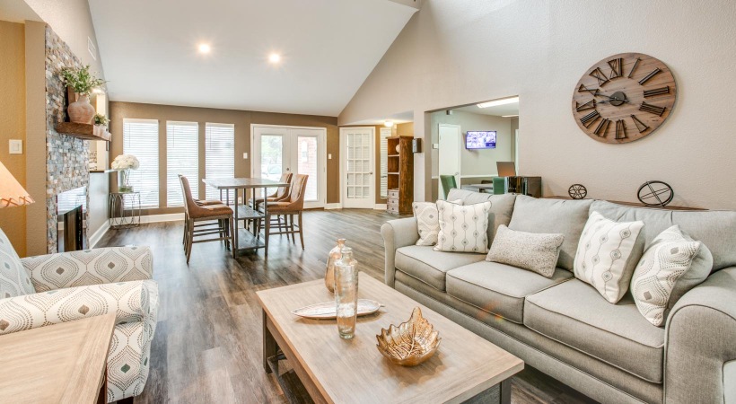 a living room with a couch and a table