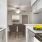 a kitchen with a stove and a table