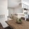 a kitchen with a table and chairs